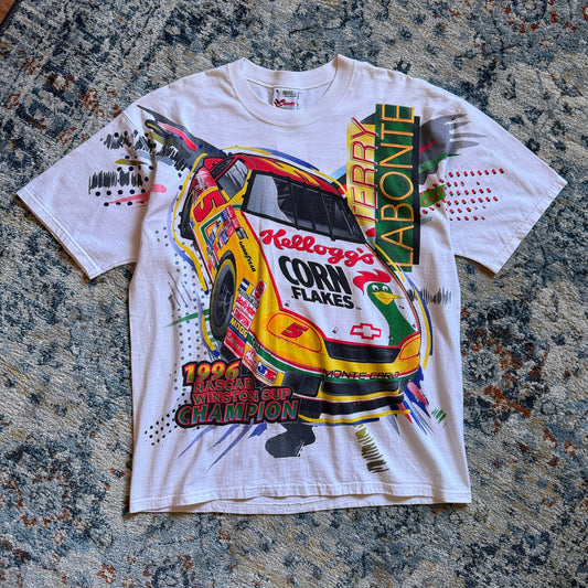 (XL) Vintage 1996 Kellogg's Cornflakes Racing All Over Print Tshirt
